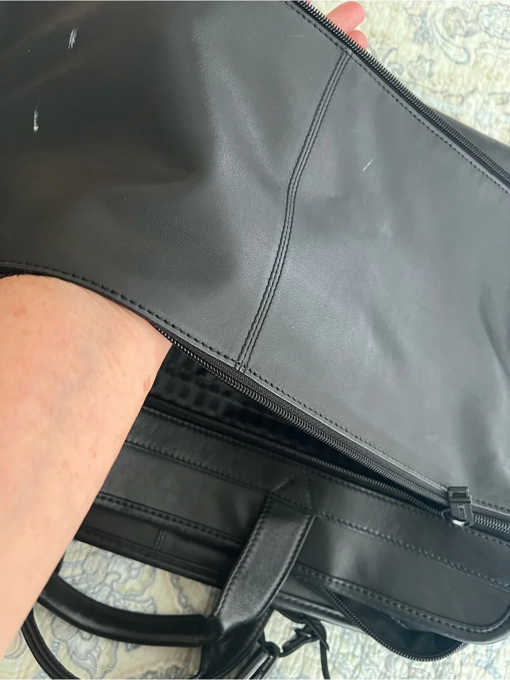 Tumi sleek leather